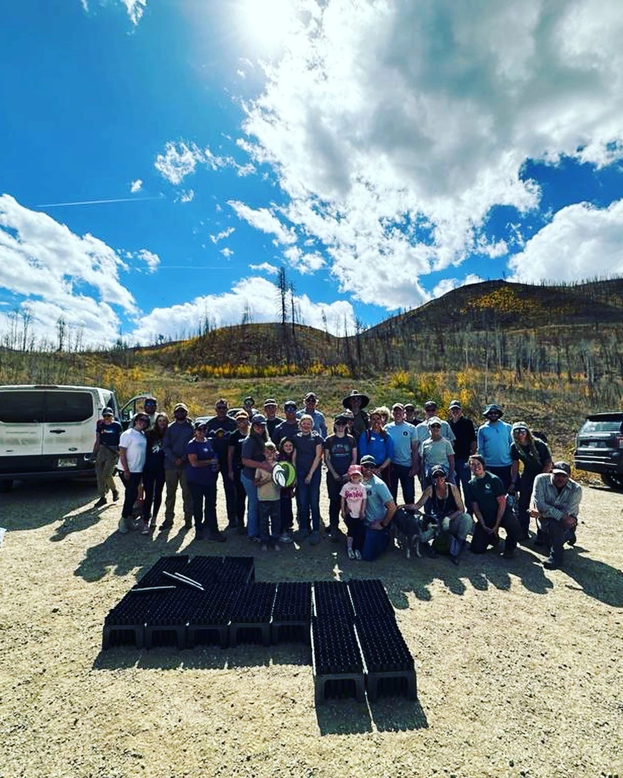The C Lazy U staff working together on the ranch towards environmental sustainability initiatives.