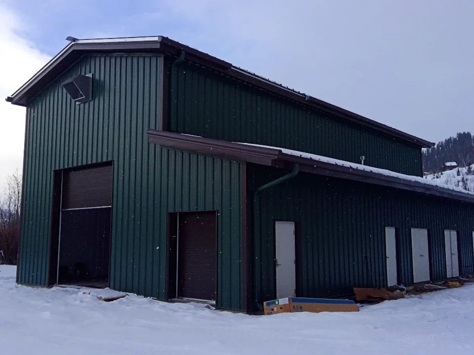 The exterior of a green building at C Lazy U Ranch, which houses their wastewater treatment facility.