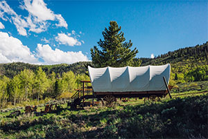 glamping The Conestoga Wagon you can glamp in at The C Lazy U