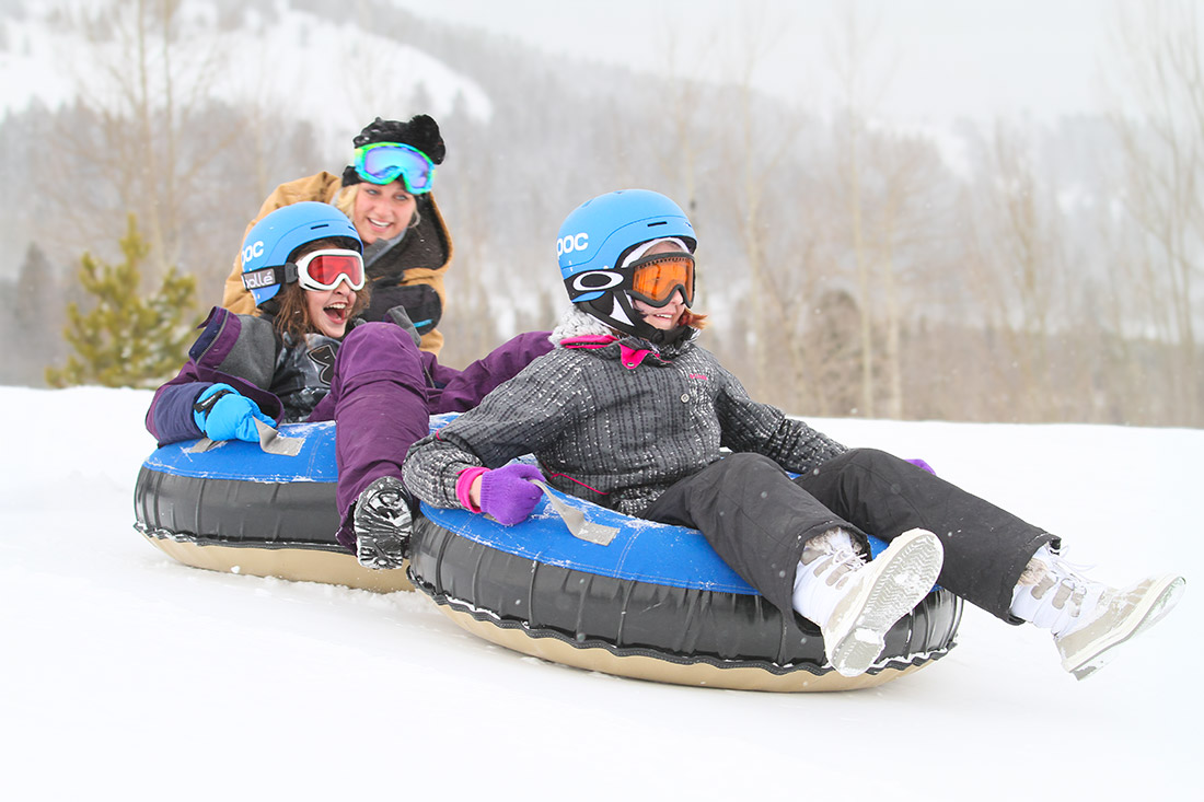 teen-girls-snow-tubing-counselor