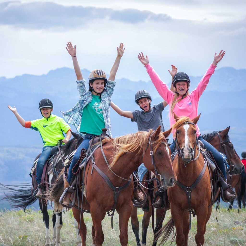 teens-celebrating-on-horseback Teens having fun on horseback